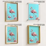 Three pink flamingo