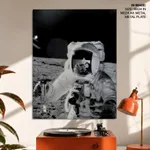 Astronaut Alan Bean holds Special Environmental Sample Container