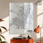 Strip below poster white map of Bogota