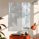 Strip below poster white map of Khartoum